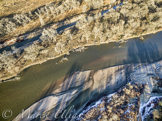 aerial view of South Platte River in eastern Colorado with a canoe on sandbar, fall scenery
