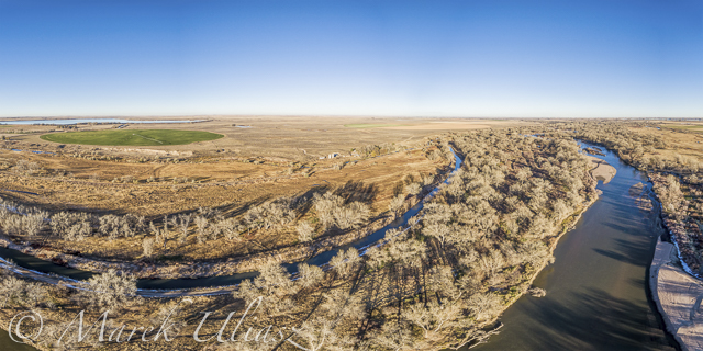 aerial view of eastern Colorado landscape with South Platte River,  water channels, reservoirs and irrigated farmland